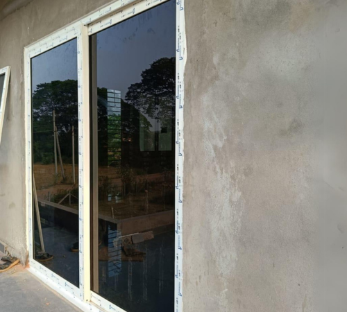 White UPVC door with clear glass panels