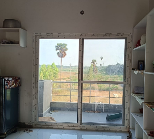 White UPVC French doors installed for a kitchen