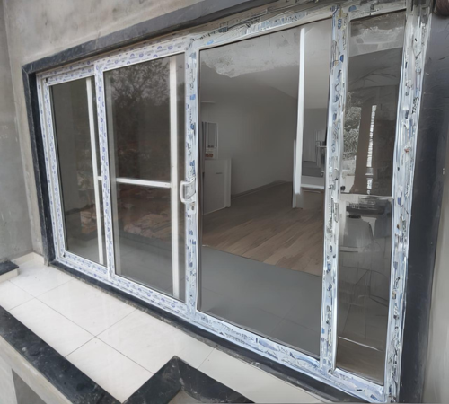 Sri Sarathi UPVC French door installation