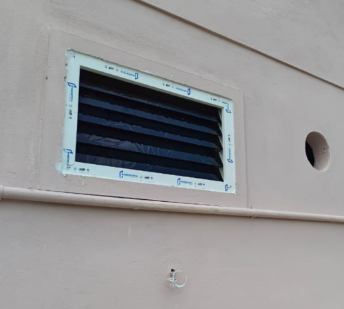 UPVC ventilator installed at the rear of a home