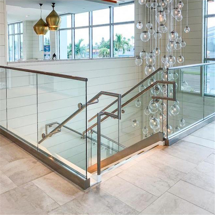 Frameless toughened glass staircase railing with aluminium channel